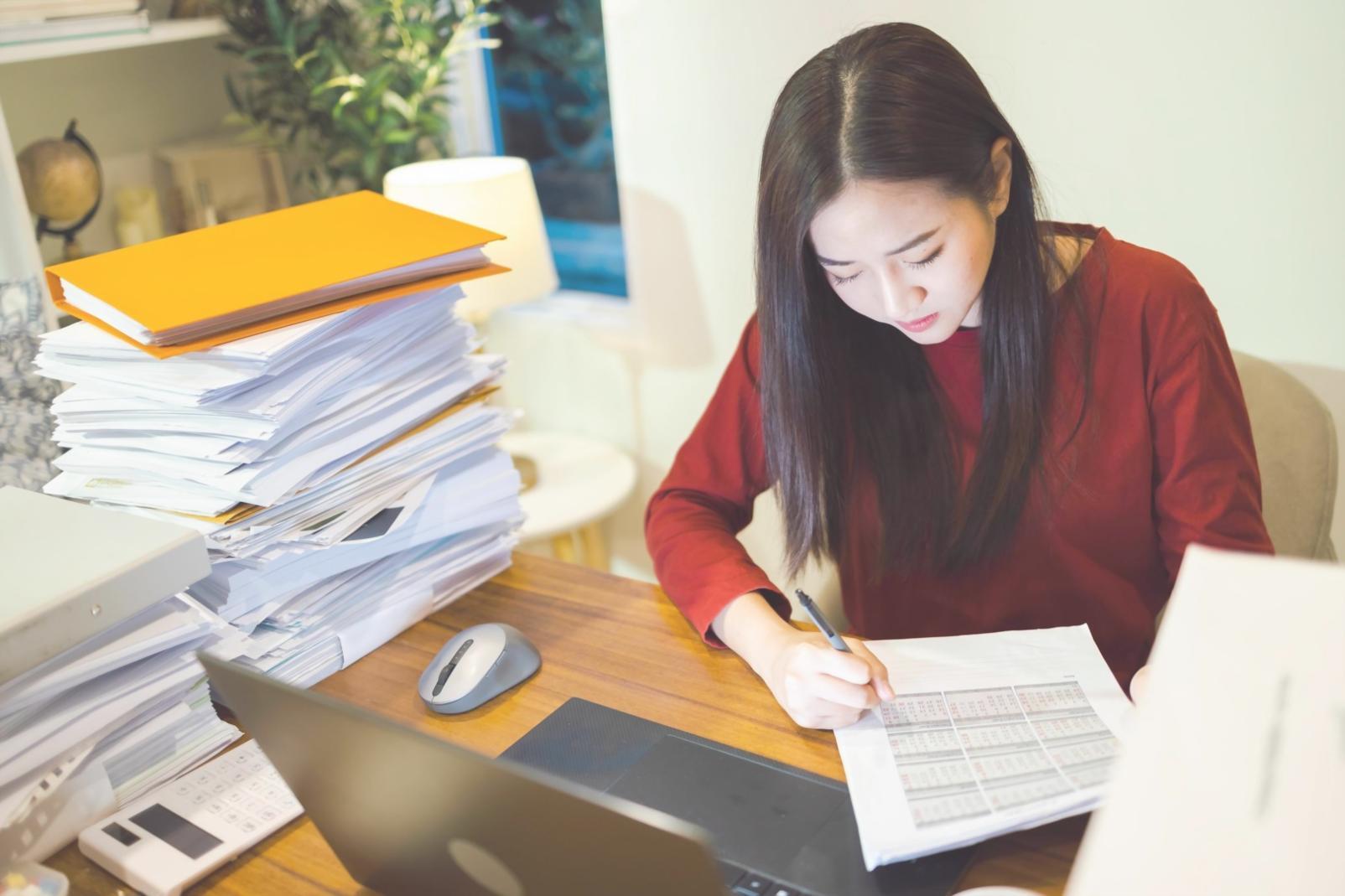 Students collaborating on debugging session during testing framework workshop